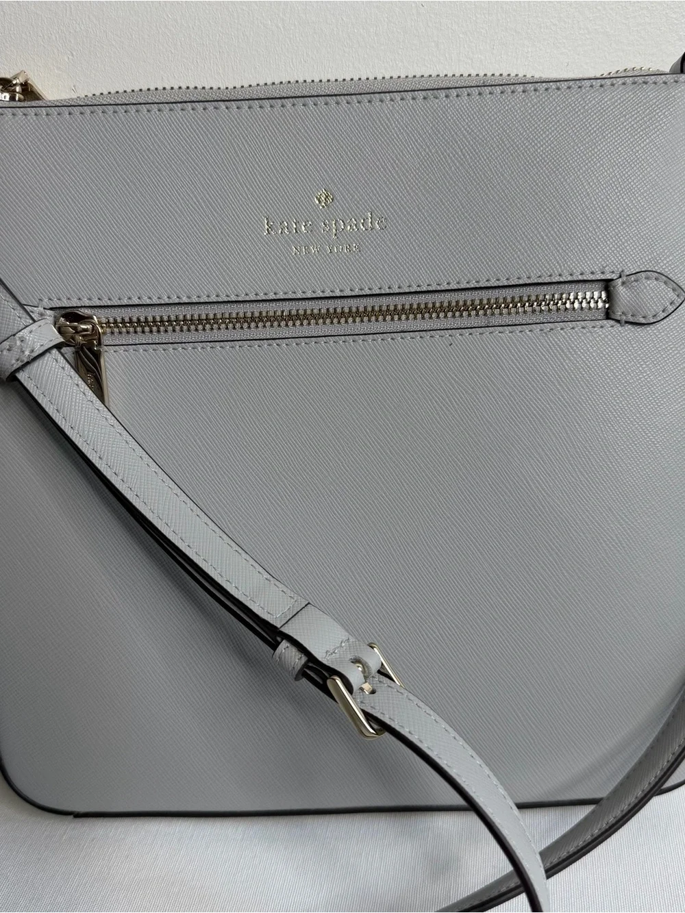 kate spade light gray saffiano leather messenger bag with gold hardware